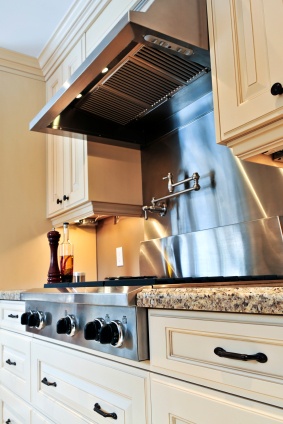 Interior of modern luxury kitchen with stainless steel appliances